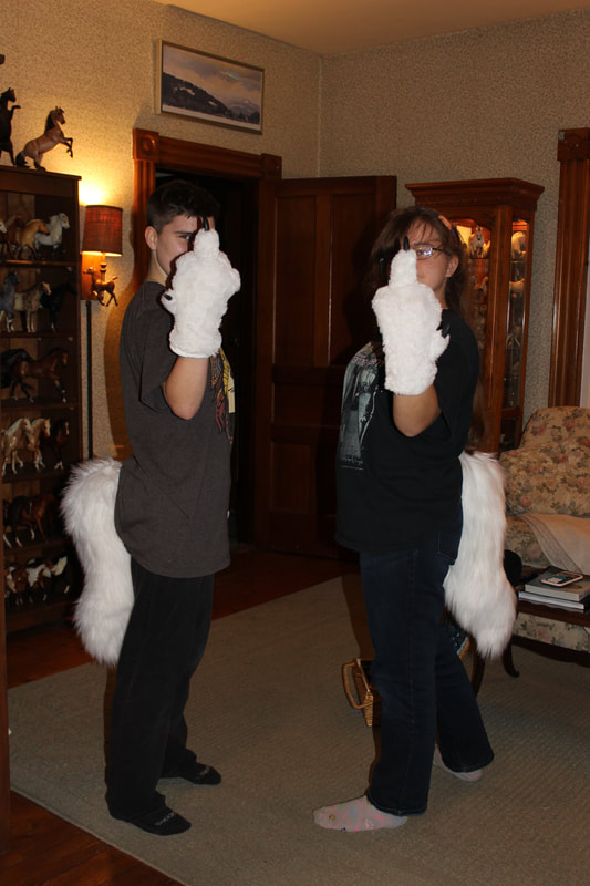white fursuit handpaws and wolf tails