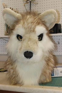 fur sewn together but not glued down to resin base