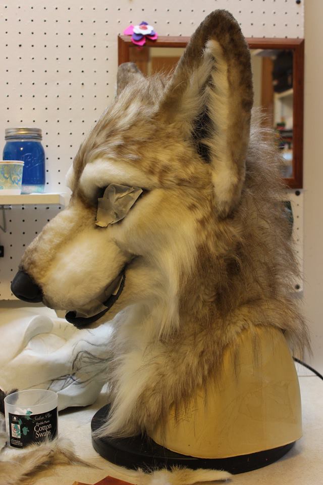 fursuit wolf head by sans souci studios side view of grey and tan airbrushing