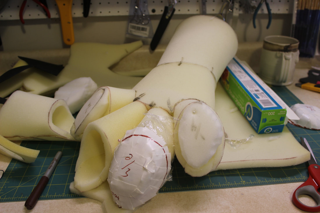 taping foam toebeans to make a handpaw pattern