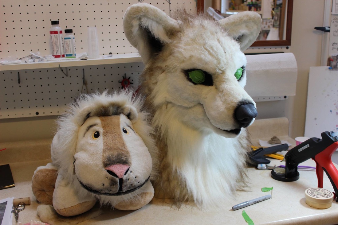 fursuit wolf head partially airbrushed