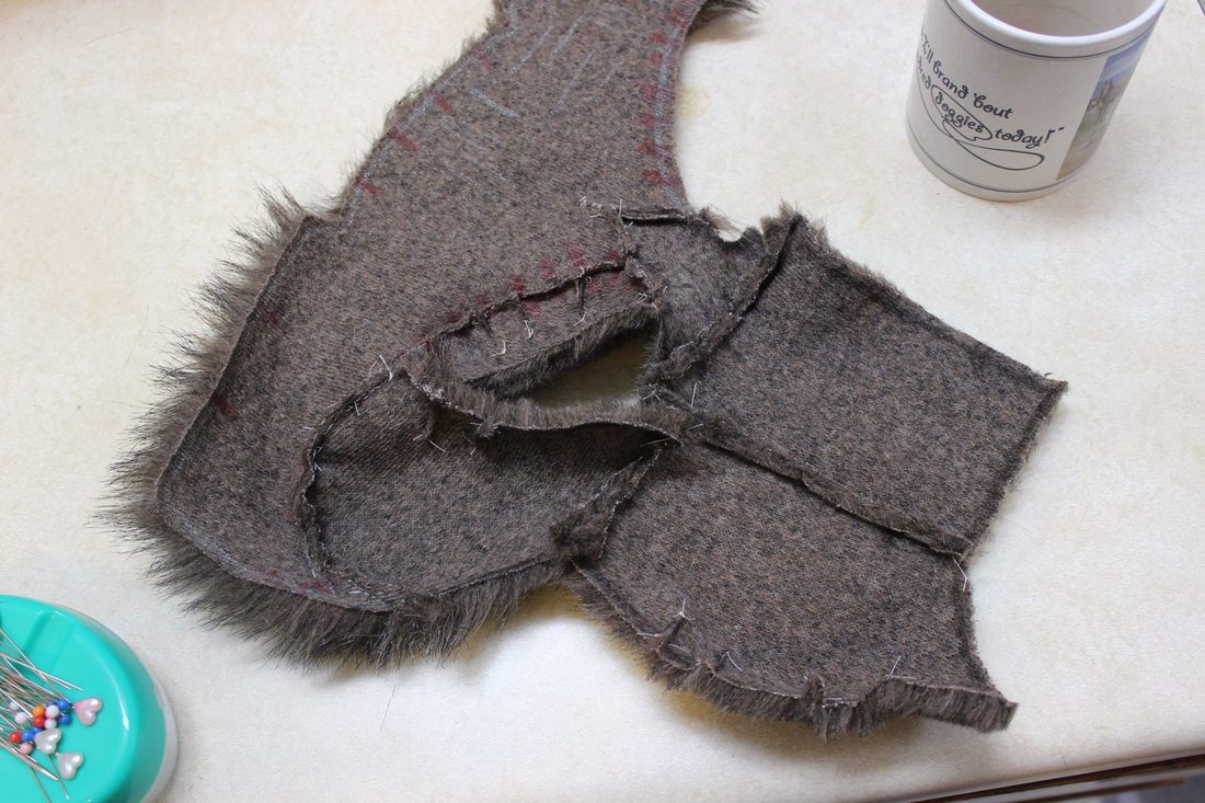 fur pieces for half the mask face machine sewn together