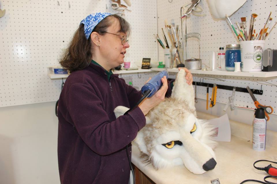 fursuit wolf head by sans souci studios getting a shave