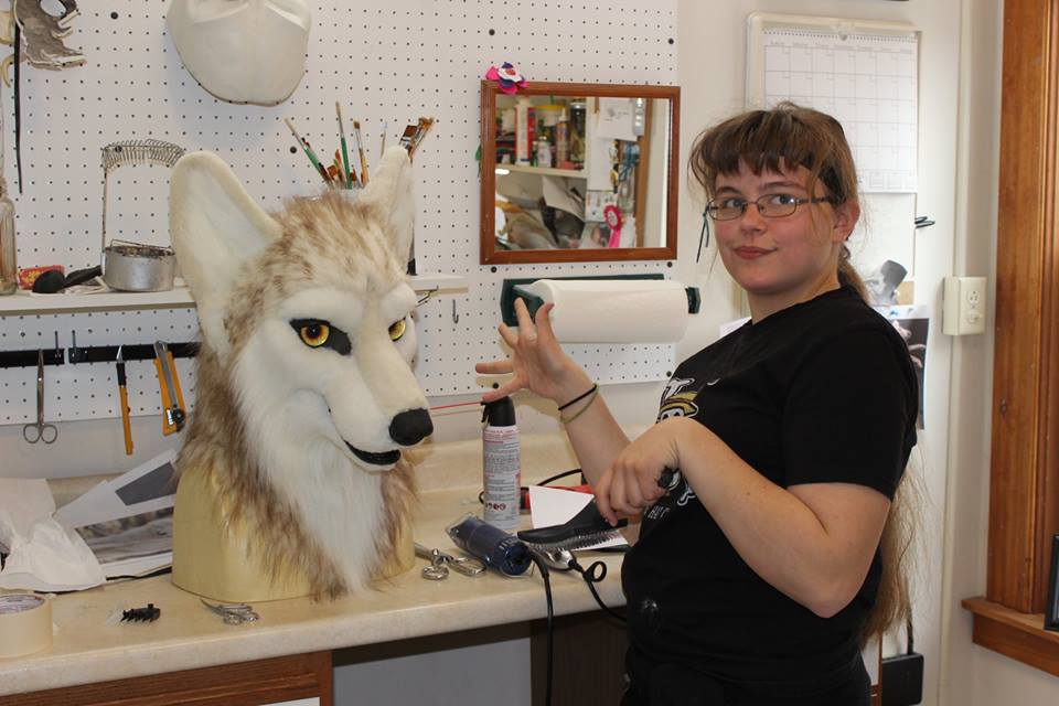 fursuit wolf head by sans souci studios getting brushed out