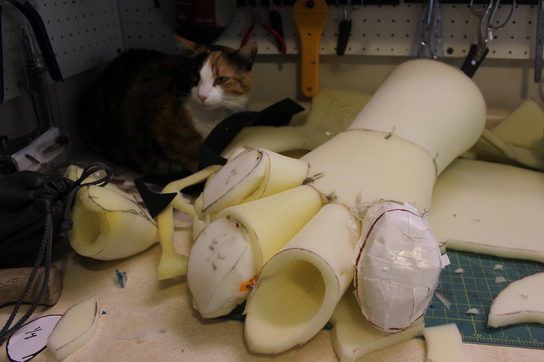 taping foam toebeans to make a handpaw pattern