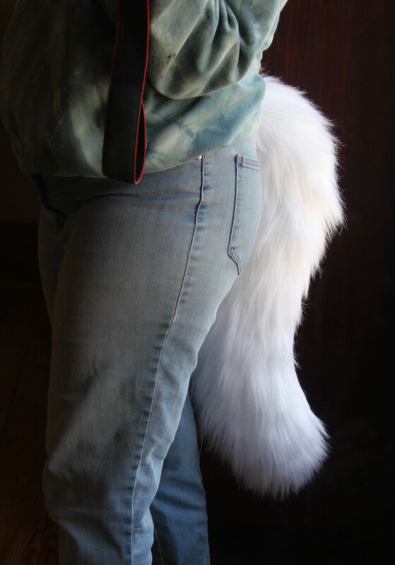 white fursuit wolf tail